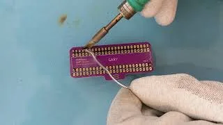 Drag soldering through-hole pins